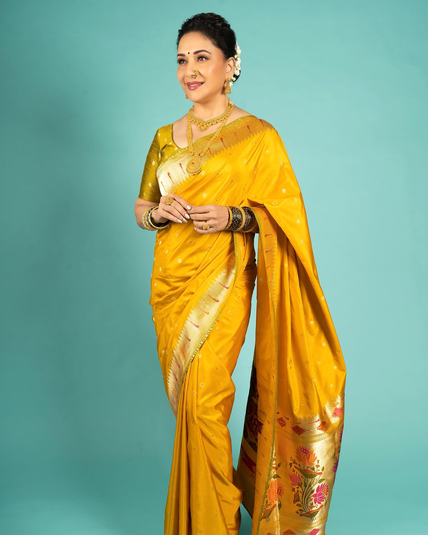 Madhuri Dixit in Sacred Weaves' Paithani Banarasi Saree