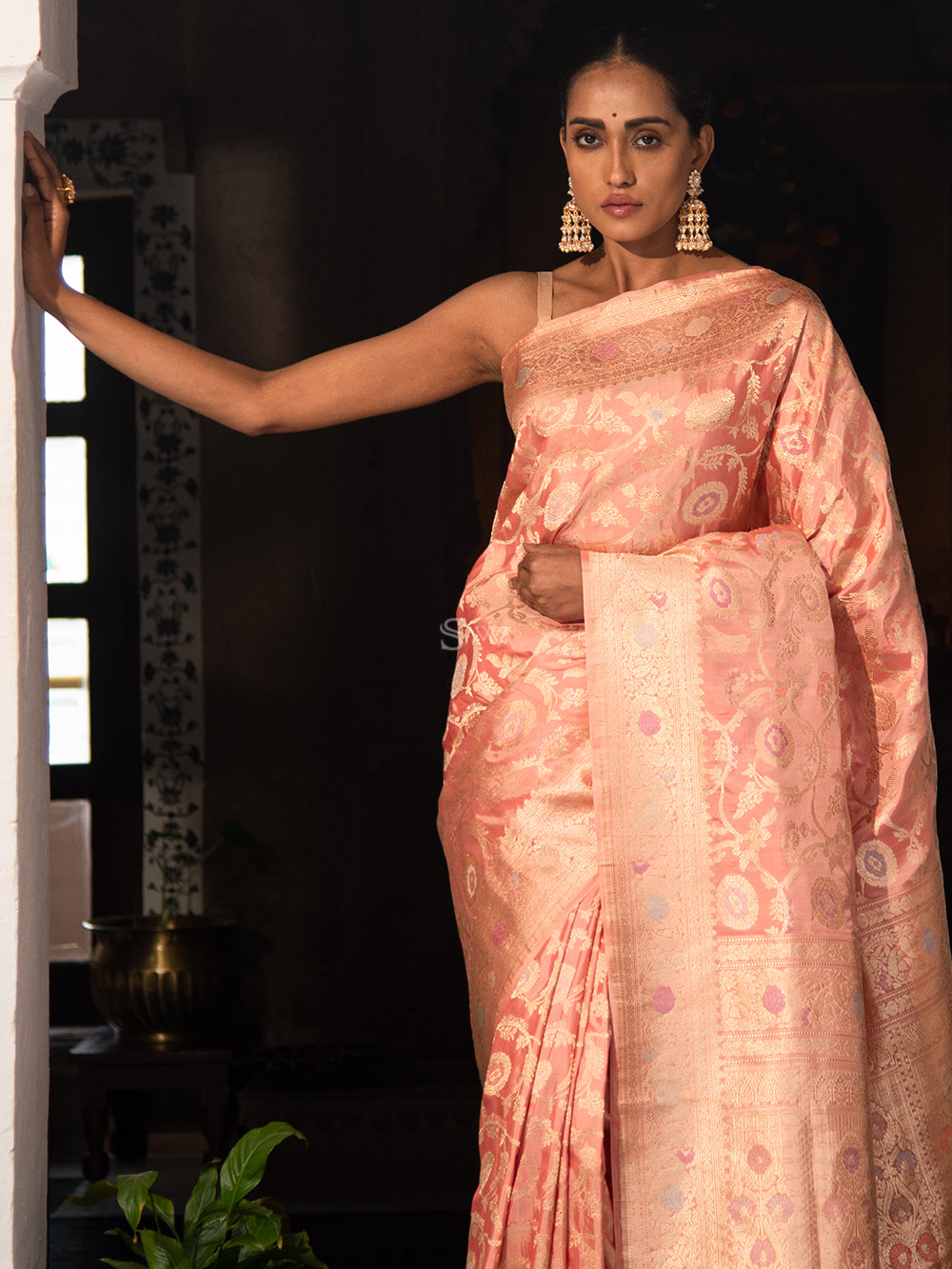 Nalli - This peach Banarasi Georgette saree is resplendent... | Facebook